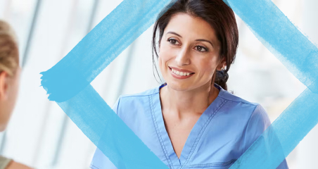 1. A woman converses with another woman, both framed in blue, suggesting a friendly or professional discussion.