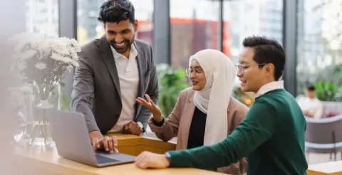 Group of professionals working together to explore promising and rewarding career paths in finance.