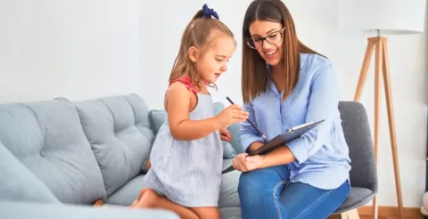 A woman providing essential support to improve mental health and emotional development in early childhood.