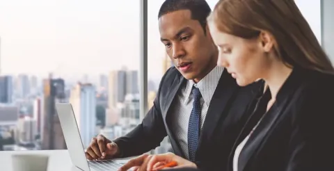 Finance expert utilizing analytical tools to master essential skills for corporate finance careers.